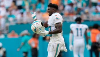 Tyreek Hill in spotlight on and off field as Miami fight back to beat Jaguars