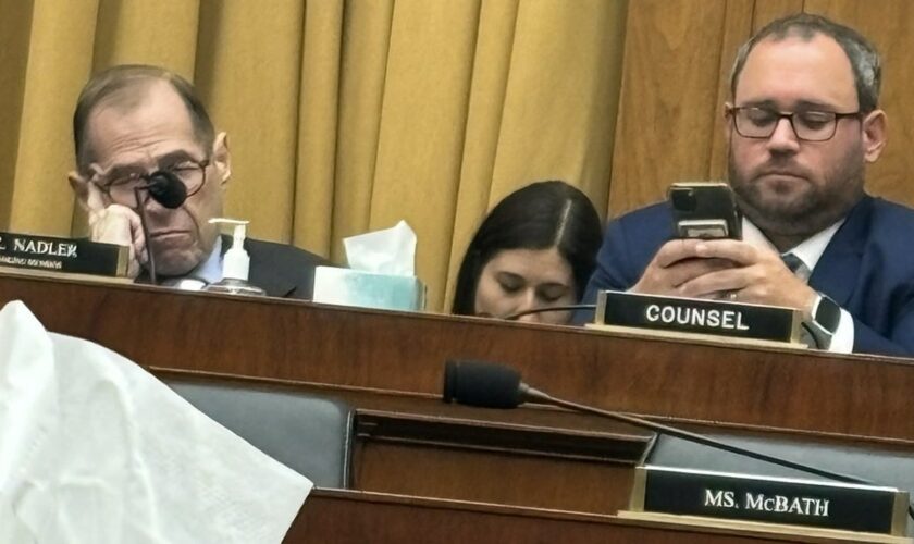 Dem Rep. Nadler pictured with head down, eyes closed during testimony from mothers of migrant crime victims