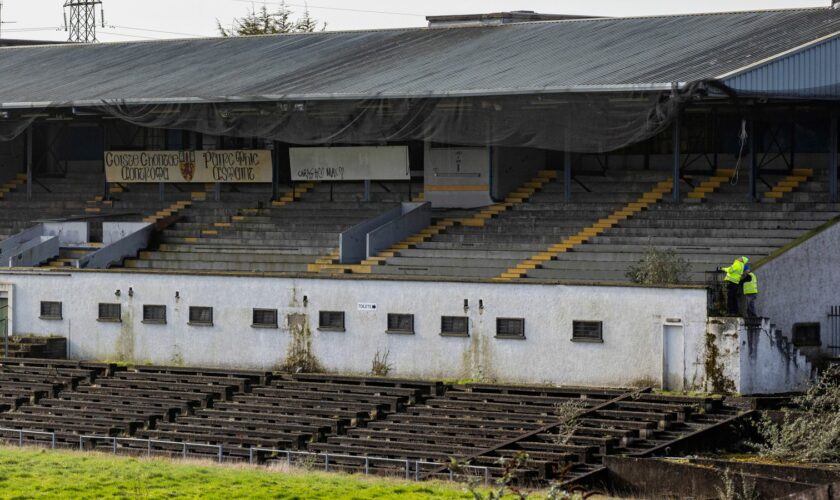 Workmen at Casement Park GAA stadium in Belfast, Northern Ireland. Contractors have begun assessing planned ground works at Casement Park ahead of the long-delayed redevelopment of the stadium.The maintenance and pre-enabling works will run until April, when the demolition of the existing terraces will begin. The GAA is undertaking the initial phase of works amid continued uncertainty over the funding of the redevelopment. The stadium in west Belfast has been earmarked for matches at the Euro 20