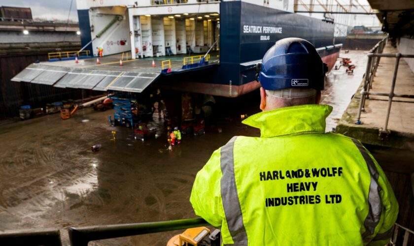 Joe Passmore looking on as workers at Harland and Wolff in Belfast begin work on the first ship to go through refit at the yard since the takeover by London-based energy company InfraStrata stepped in with a ??6m rescue deal that saved from yard from closure.