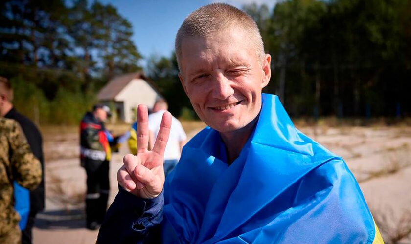 A Ukrainian reacts after being released in a prisoner exchange at an undisclosed location in Ukraine. Pic: Ukrainian Presidential Press Office via AP