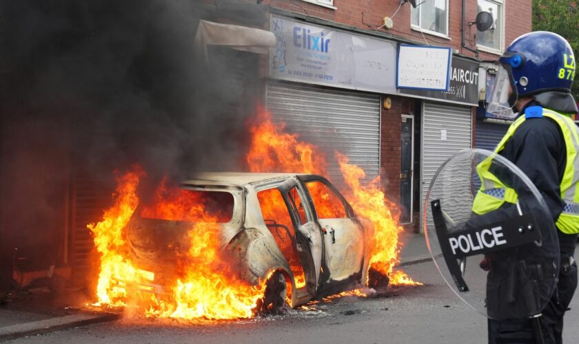 A car after it was set on fire by rioters in Middlesbrough on Sunday 4 August. Pic: PA