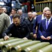 Mr Zelenskyy during his visit to the munitions plant. Pic: Reuters