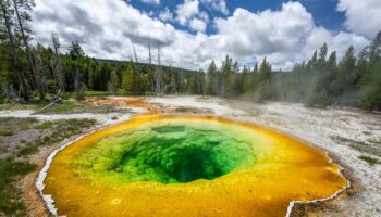 Yellowstone tourists accused of ruining park’s famous thermal pool with ‘good luck’ coin tosses