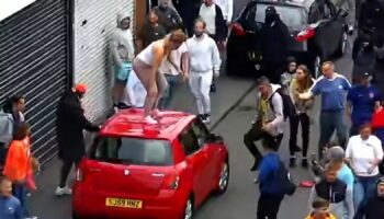 Megan Davison standing on top of a car. Pic: Cleveland Police