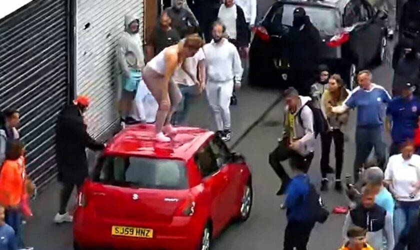 Megan Davison standing on top of a car. Pic: Cleveland Police