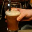 A barman pulls a pint of beer in a pub in Liverpool northern England November 19 , 2014. Britain's MPs on Tuesday voted to give people who lease pubs from big companies more freedom about where they buy their beer, overturning government plans for industry reforms. REUTERS/Phil Noble (BRITAIN - Tags: BUSINESS POLITICS FOOD SOCIETY)