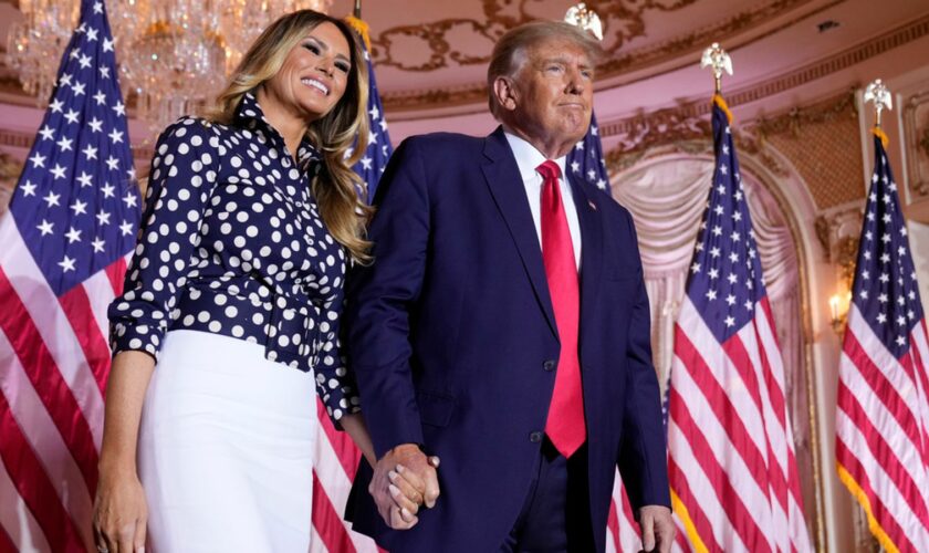 FILE - Former President Donald Trump stands on stage with former first lady Melania Trump after he announced a run for president for the third time at Mar-a-Lago in Palm Beach, Fla., Nov. 15, 2022. (AP Photo/Andrew Harnik, File)