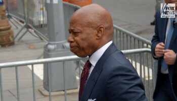 NYC Mayor Eric Adams arrives to turn himself in to face charges in federal corruption case