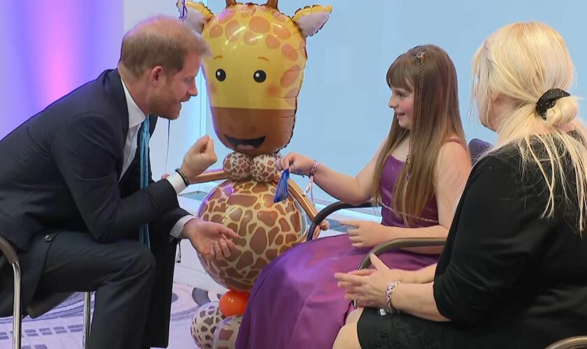 Duke of Sussex with Scarlett Cripps at the WellChild Awards, grab from pool footage in system