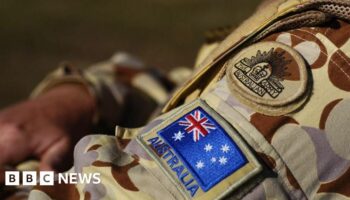 Australia strips officers' medals for war crimes culture