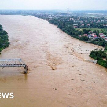 Cars plunge into river as super typhoon destroys Vietnam bridge