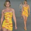 Gigi Hadid is shipping fashion to new heights as she sports mini dress made from DHL parcel tape for Vetements catwalk during Paris Fashion Week