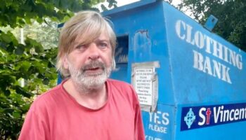 Homeless man living inside city clothes bin says 'it's the comfiest bed I've had'