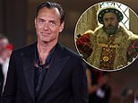 Jude Law reveals he gorged on 'late night pasta and ice-cream' for his 'extreme' transformation into a bloated Henry VIII as he reflects on THAT 'upsetting' Chris Rock jibe