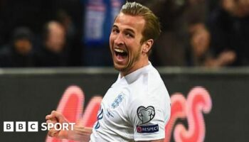 Harry Kane celebrates scoring on his England debut