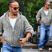 Lewis Hamilton ditches his snazzy Formula One looks for a low-key grey cardigan and jeans while heading out to lunch in New York City