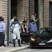 Moment ex-convict is greeted outside prison by a £200K Lamborghini after being freed early under Labour's controversial scheme as hundreds of criminals celebrate release from prison