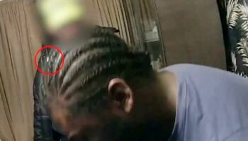 Moment gunman caught red-handed after cops spot key clue in his hair