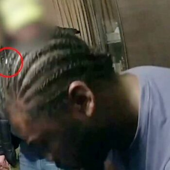 Moment gunman caught red-handed after cops spot key clue in his hair