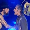 Moment lead singer of iconic rock band Jane's Addiction explodes onstage, punches guitarist mid-song