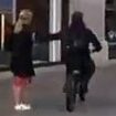 Moment thief on an e-bike snatches mobile from woman on Oxford Street as London's phone theft epidemic claims yet another victim