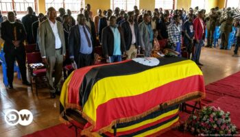 Slain Ugandan Olympian buried with full military honors