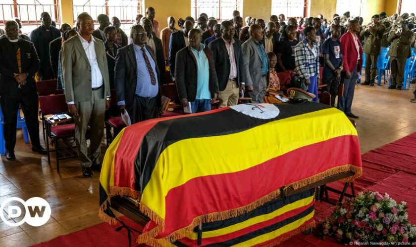 Slain Ugandan Olympian buried with full military honors