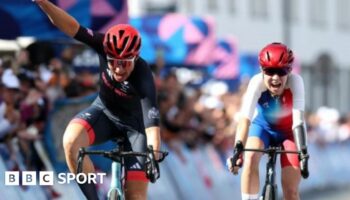 Sarah Storey celebrates winning the road race at the Paralympics