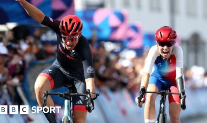 Sarah Storey celebrates winning the road race at the Paralympics