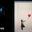 Two men charged over stolen Banksy artwork