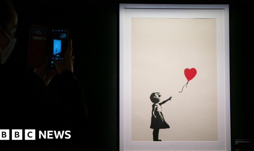 Two men charged over stolen Banksy artwork