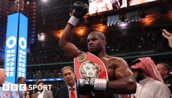 Daniel Dubois celebrates after beating Anthony Joshua