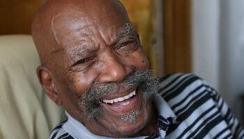 Alford Gardner who arrived in Britain in 1948 on the first Windrush ship to dock in Tilbury, Essex, speaking at his home in Leeds.