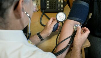 EMBARGOED TO 0001 THURSDAY SEPTEMBER 3 File photo dated 10/09/14 of a doctor checking a patient's blood pressure at the Temple Fortune Health Centre GP Practice near Golders Green, London. British adults in their 30s and 40s are healthier than their counterparts in the US - but are more likely to think their health is poor, a study has suggested. Issue date: Thursday October 3, 2024.