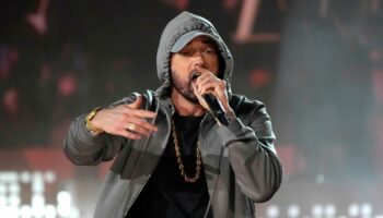 Eminem performs during "Live From Detroit: The Concert at Michigan Central" on Thursday, June 6, 2024, in Detroit. (AP Photo/Carlos Osorio)