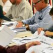 People hand-counting votes in the 2016 US election. Pic: AP