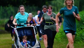 Runners taking part in the Parkrun at Bushy Park in London, the largest and oldest Parkrun in the UK, and one of many runs taking place across the country for the first time since last March. Picture date: Saturday July 24, 2021.