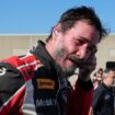 Keanu Reeves drives during the GR Cup Series auto race at Indianapolis Motor Speedway, Saturday, Oct. 5, 2024, in Indianapolis. (AP Photo/Darron Cummings)