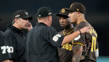 Padres' NLDS Game 2 win over Dodgers turns ugly as fans throw objects at San Diego players