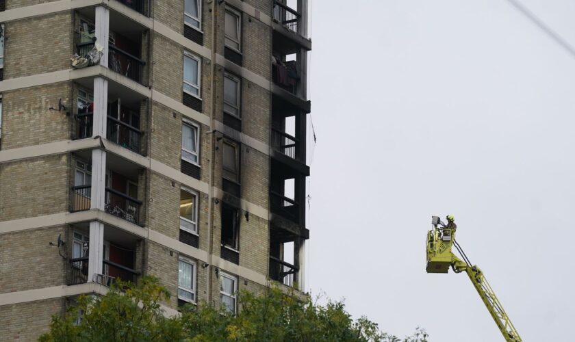 Emergency services at the scene of a fire at a residential block on Queens Road West, Plaistow, London. Picture date: Monday October 21, 2024.