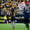 Woman runs onto Steelers' field with pro-Trump sign as former president attends game