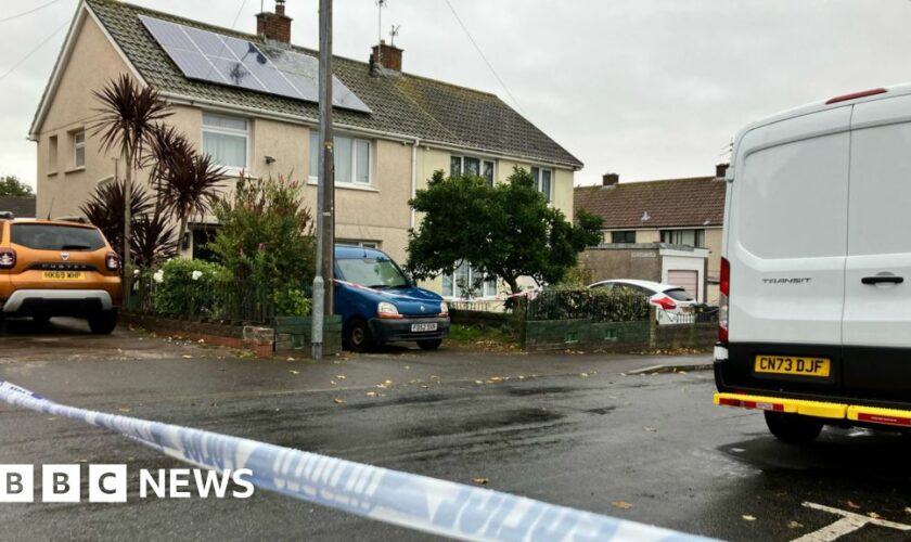 Couple found with dead dog and rifle were 'devoted'