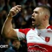 Hull KR's James Batchelor celebrates scoring the opening try against Warrington.