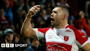 Hull KR's James Batchelor celebrates scoring the opening try against Warrington.