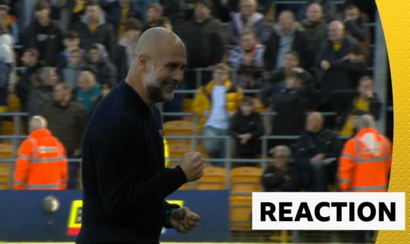 Pep Guardiola celebrates Manchester City's goal