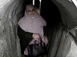 Moment Hamas leader Yahya Sinwar's wife appears holding $32,000 bag as IDF release video and pictures of secret lair