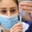 A woman receives the Covid vaccine