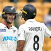 New Zealand batters Will Young and Rachin Ravindra celebrate victory in India