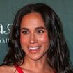 Now Meghan goes solo: Duchess of Sussex ensures all eyes are on her as she rewears revealing red Carolina Herrera gown in surprise appearance at LA children's hospital gala